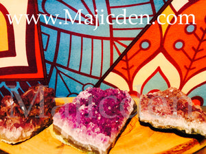 Amethyst clusters- wealth, positive energy , balance , healing , strength, longevity , placed in home or altar clusters of beauty/ power/Uphold Energy